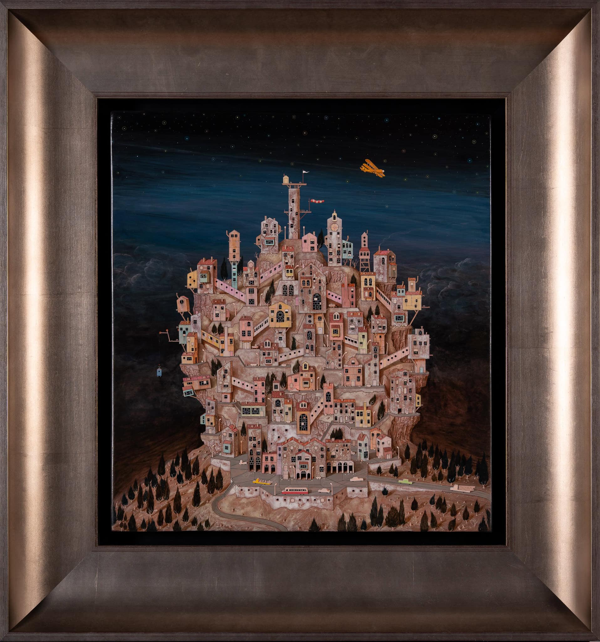 Nocny przelot nad skalistą osadą